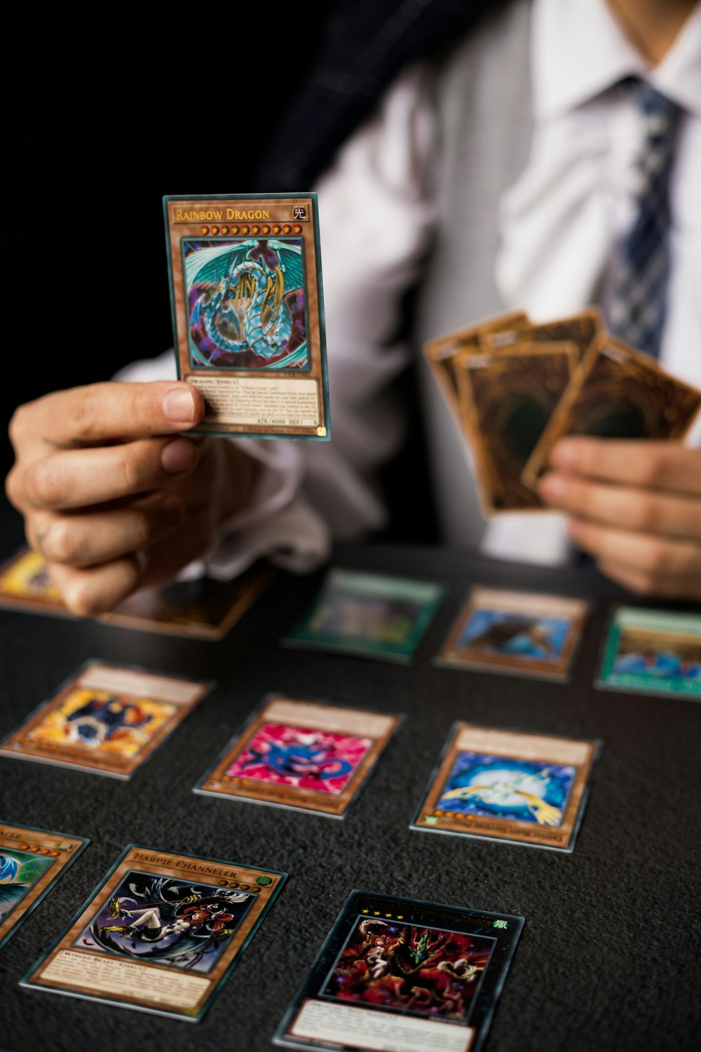 a man holding a deck of cards in his hands