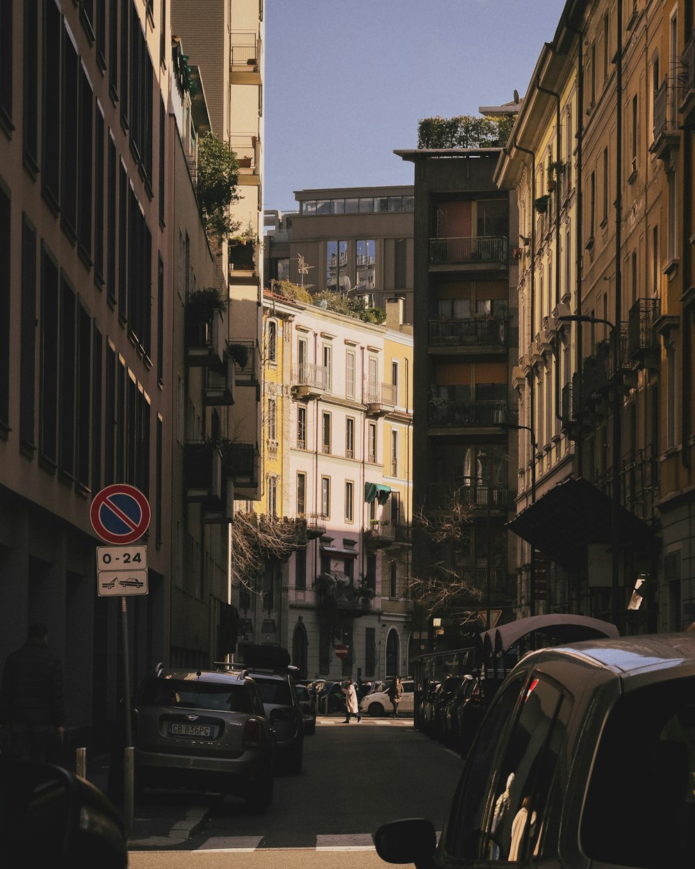 a city street filled with lots of tall buildings