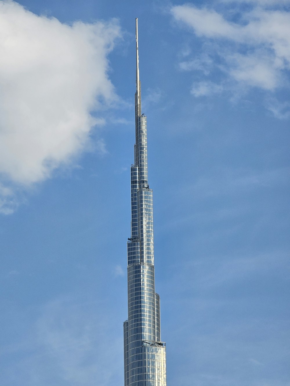 a very tall building with a very tall spire