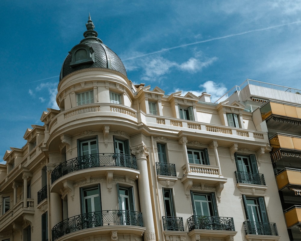 a tall building with a clock on the top of it