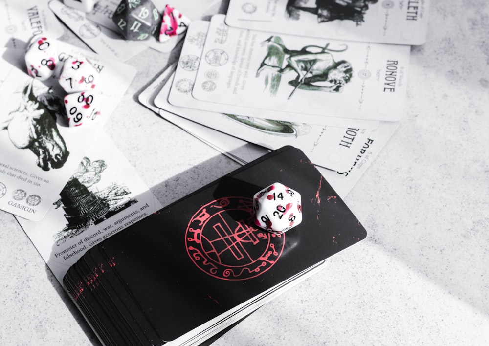 a close up of a book with a dice on it