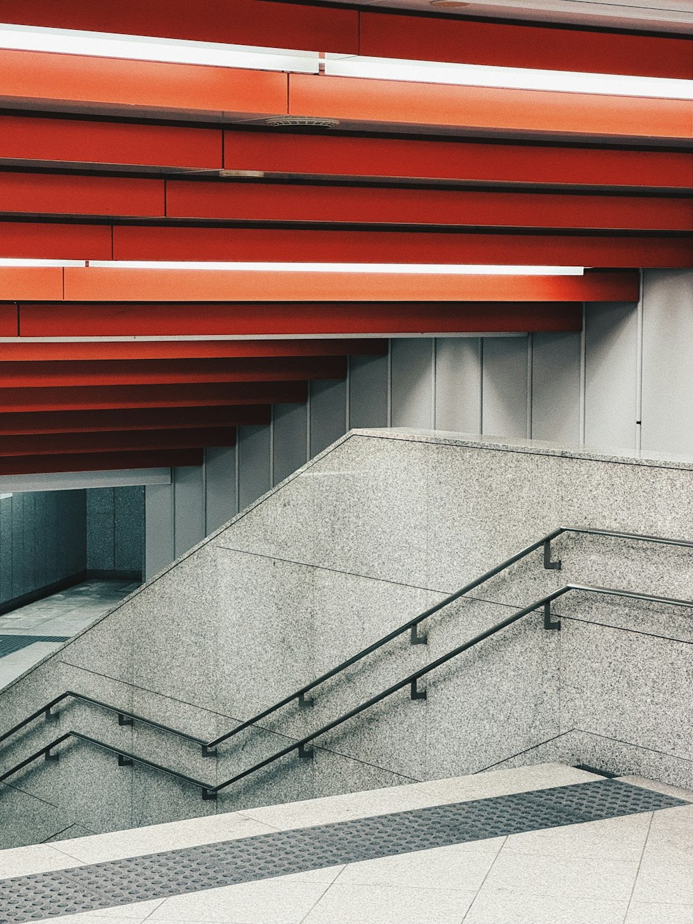 a man riding a skateboard down a set of stairs