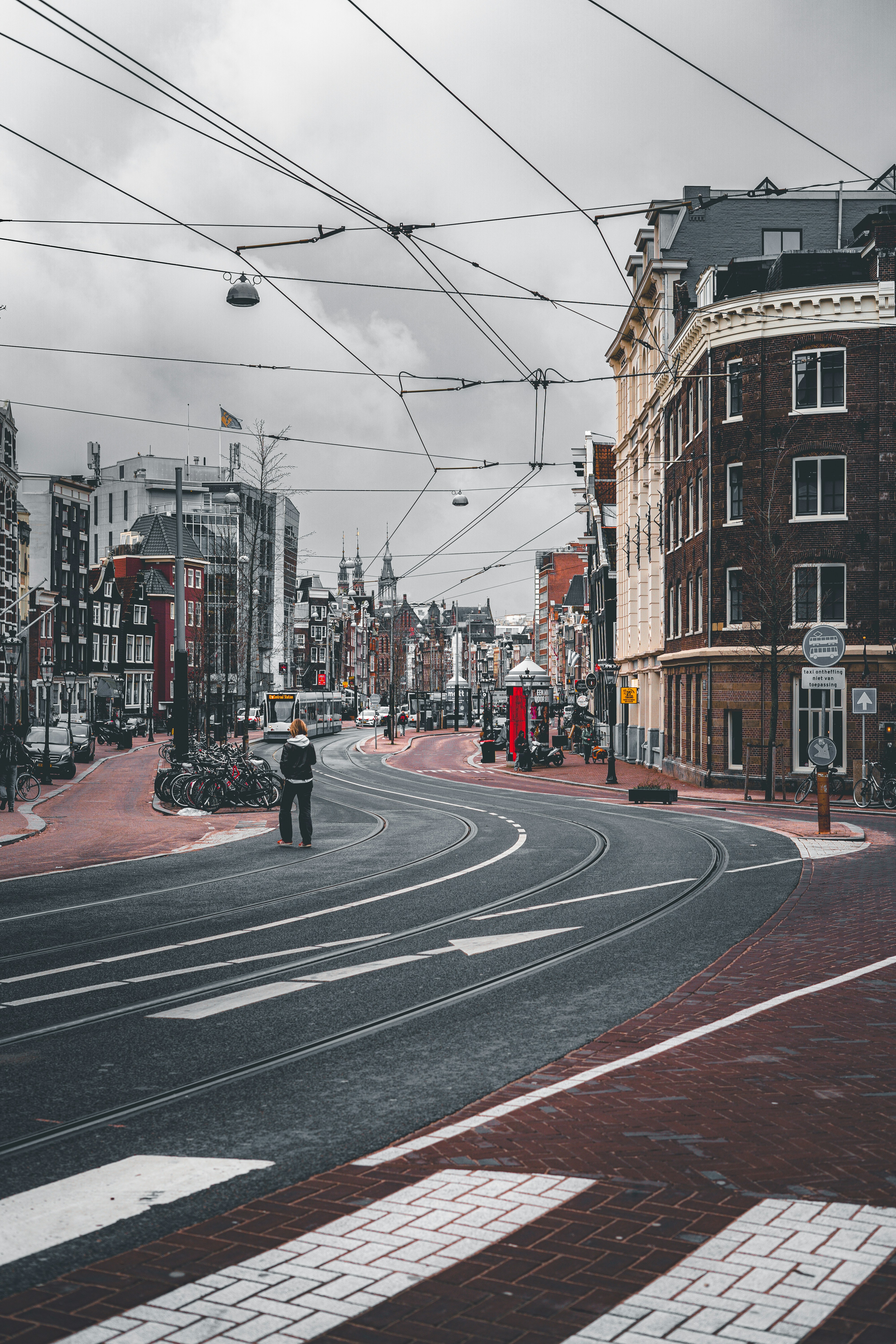a couple of people that are standing in the street
