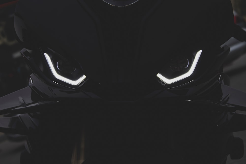 a close up of the headlights of a motorcycle
