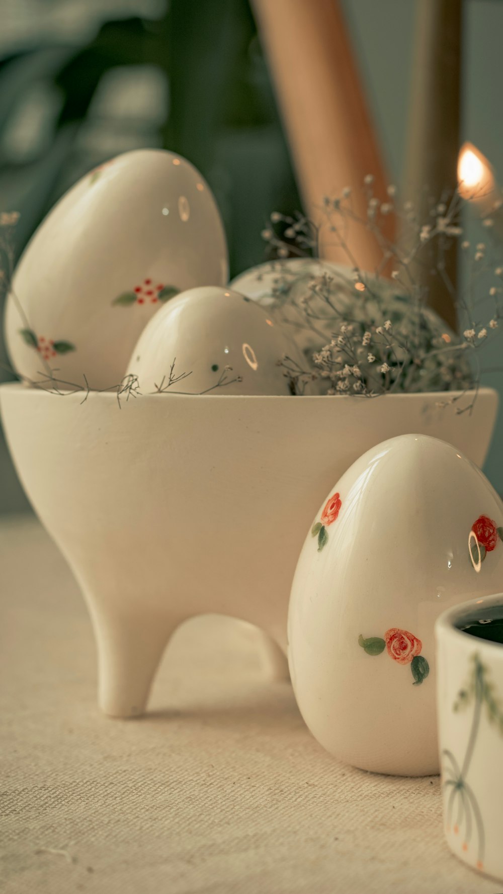 a white bowl filled with eggs sitting on top of a table