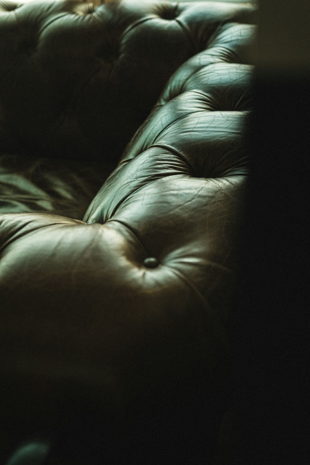 a close up of a brown leather couch