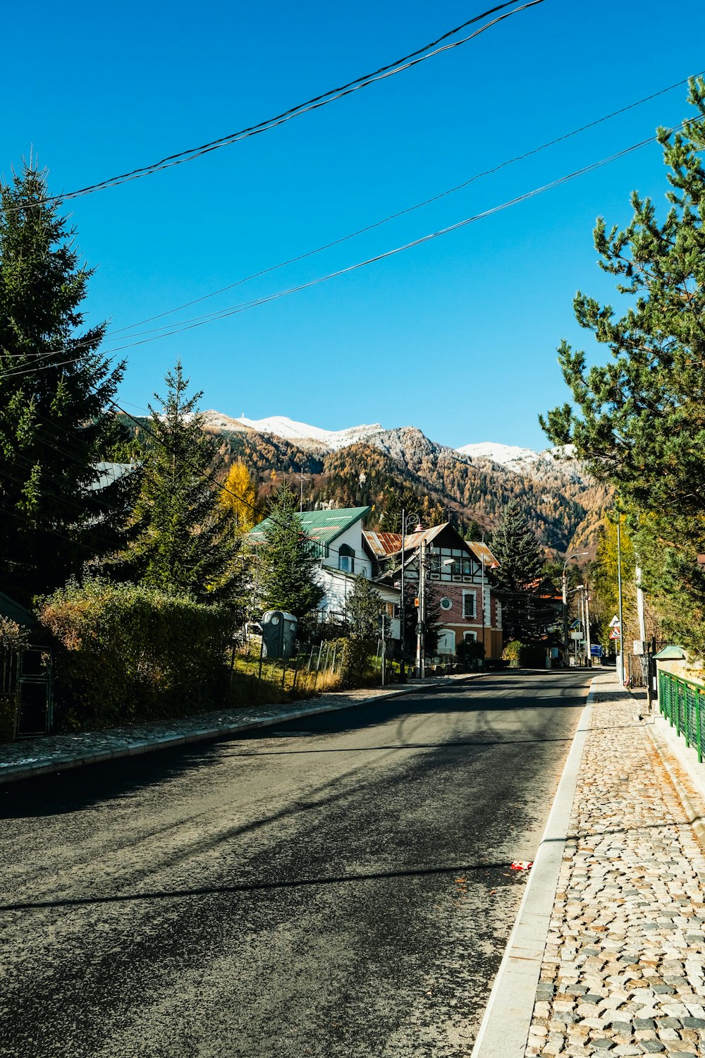 a street with a mountain in the background