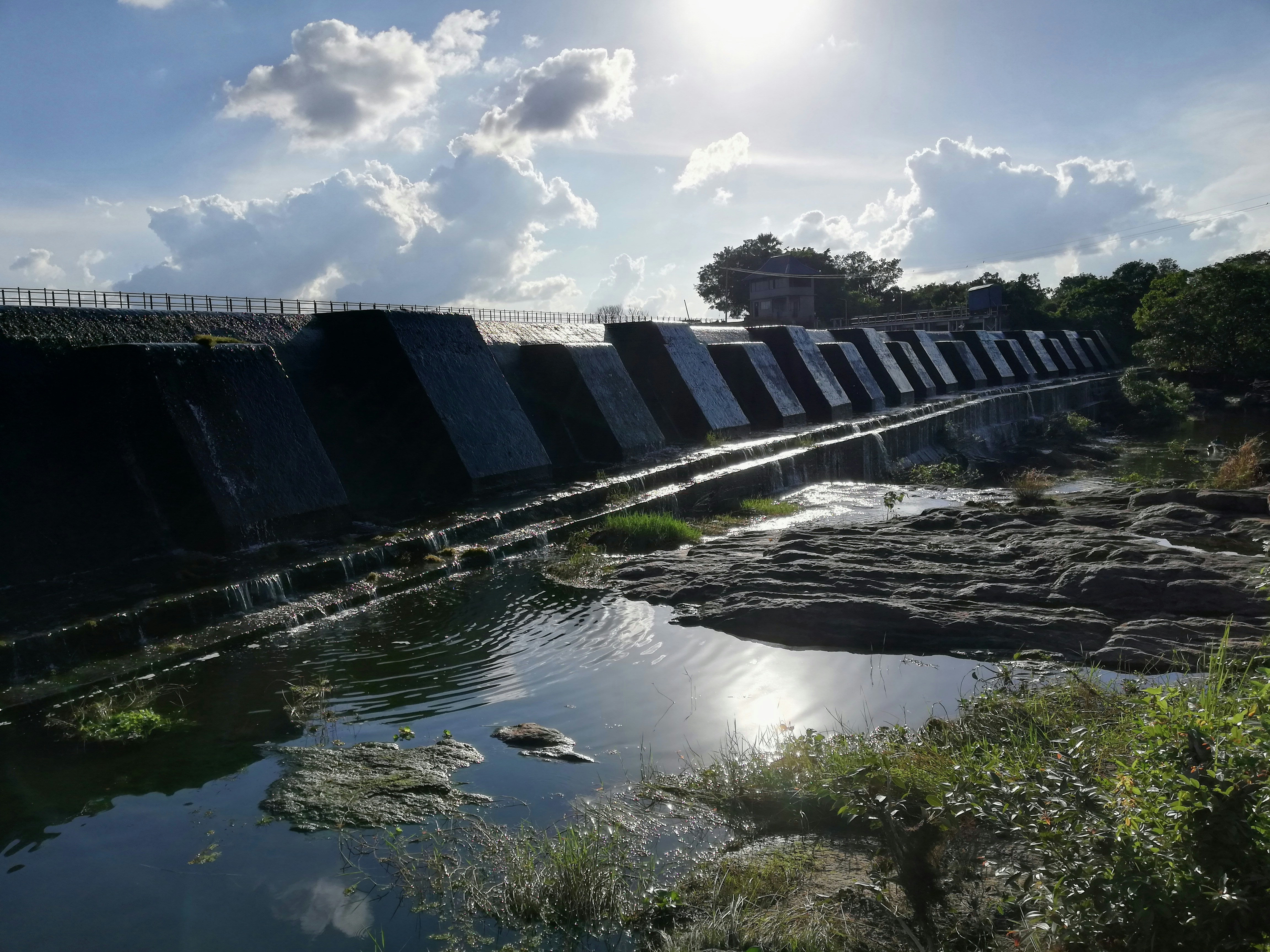 the sun is shining over a dam - Anuradhapura