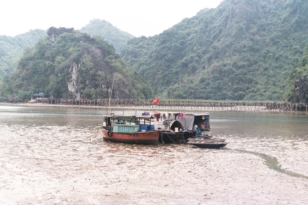 a small boat floating on top of a river