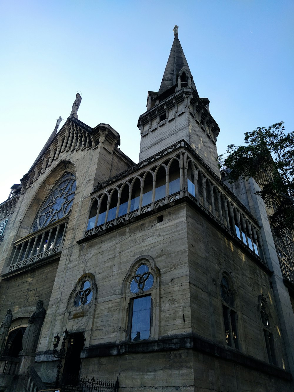 a tall building with a clock on the top of it