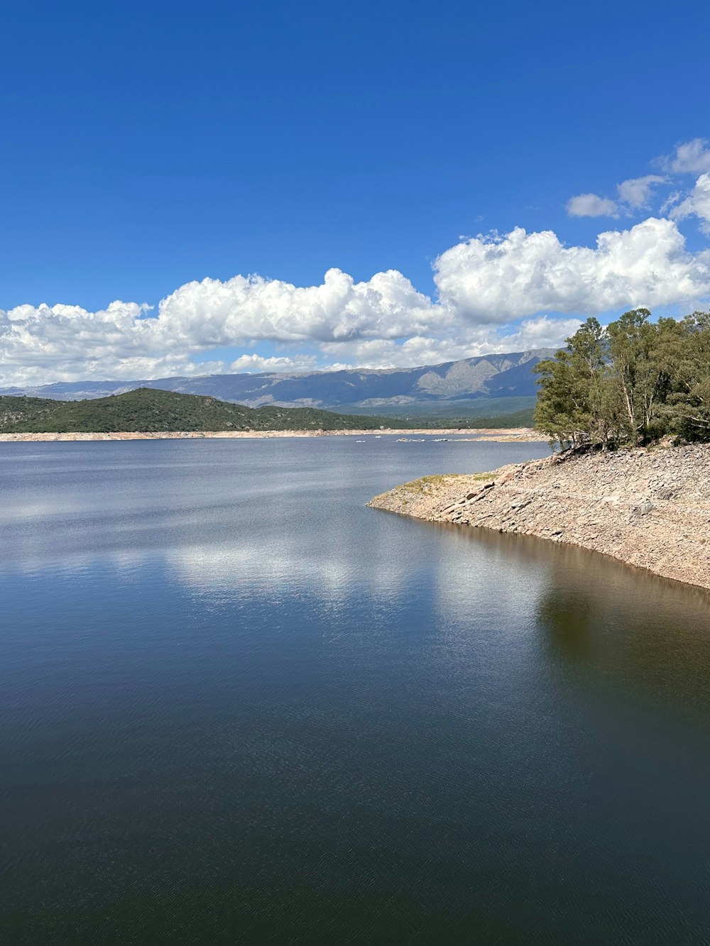 a large body of water surrounded by mountains