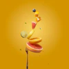 a piece of fruit falling off of a fork