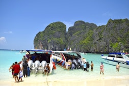 a group of people preparing for a speedboat tour
