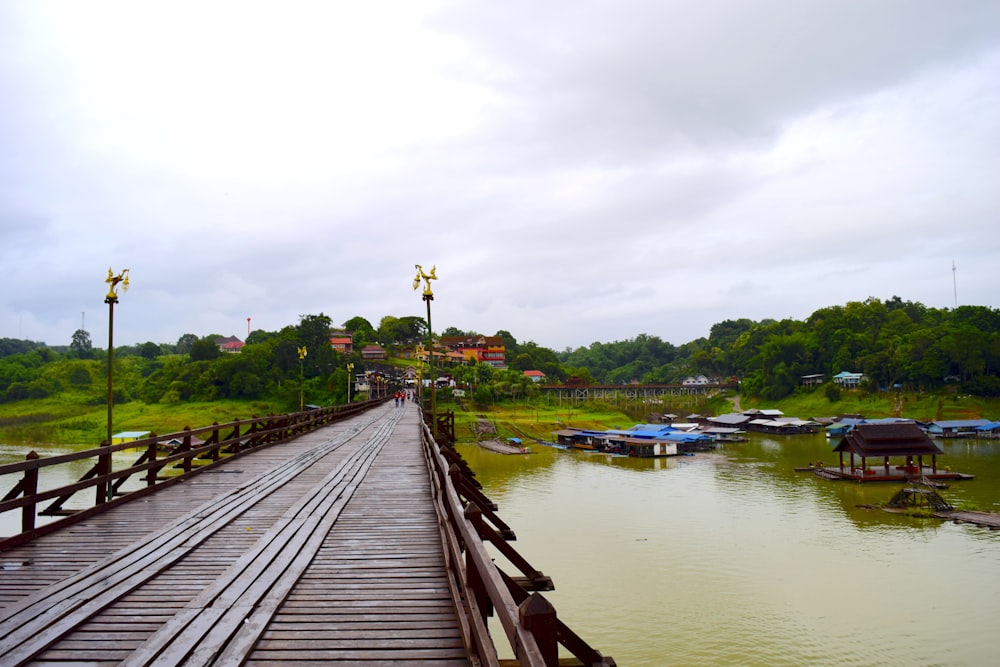 a wooden bridge over a body of water