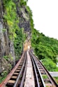 a train track going up a mountain side