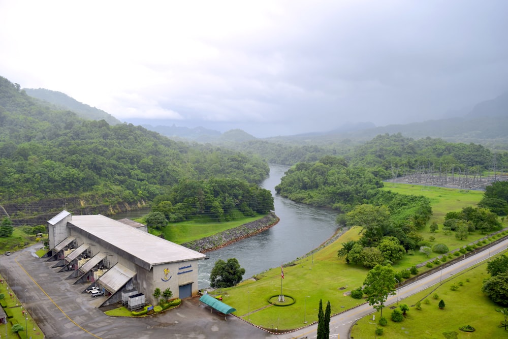 an aerial view of a parking lot and a river