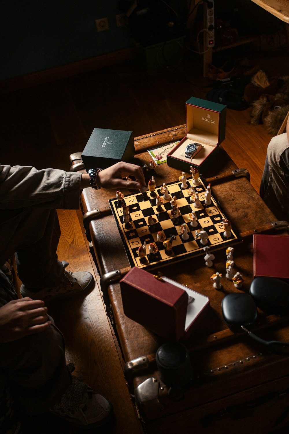 two people playing a game of chess on a table