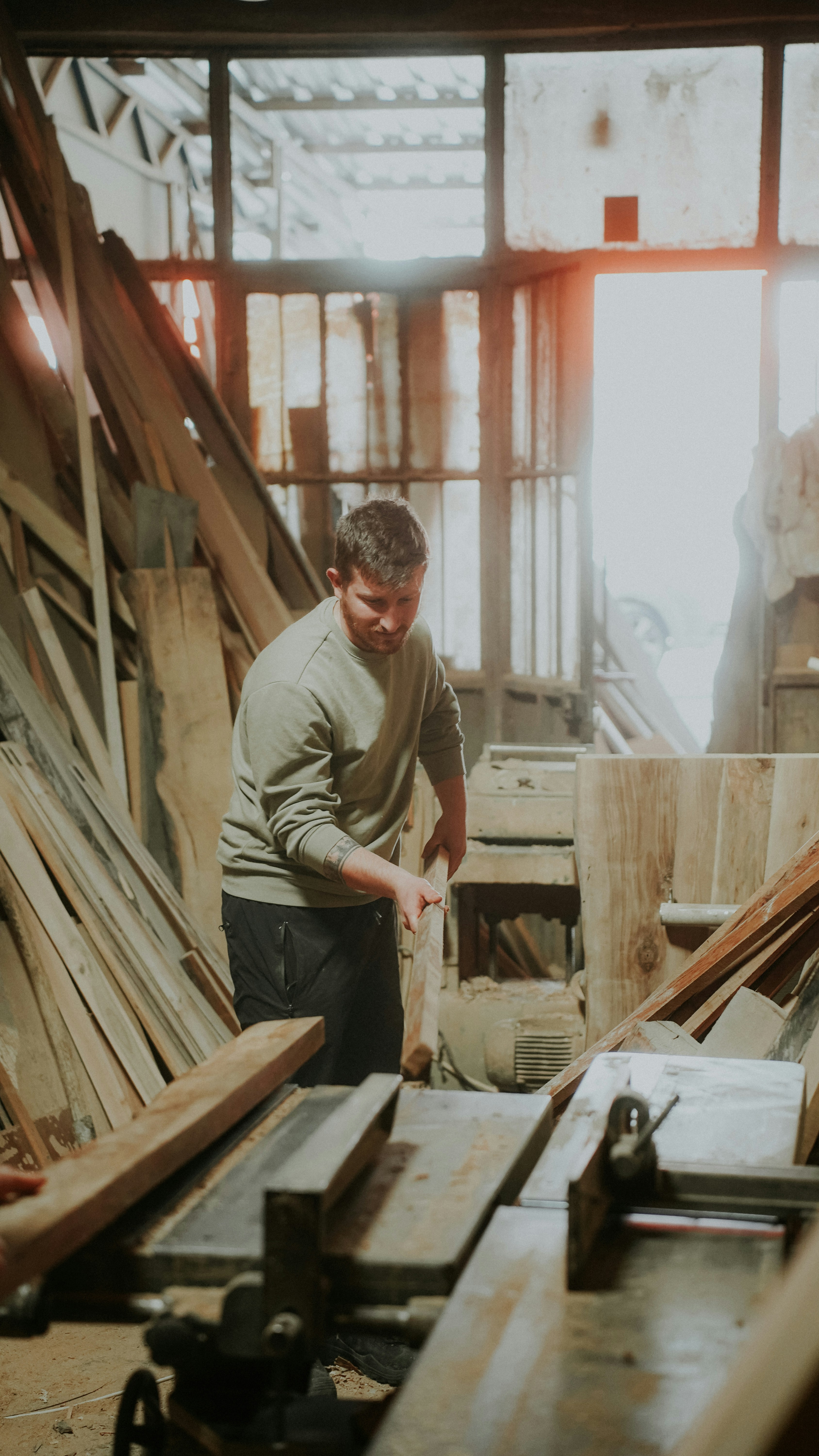 a man working on a piece of wood