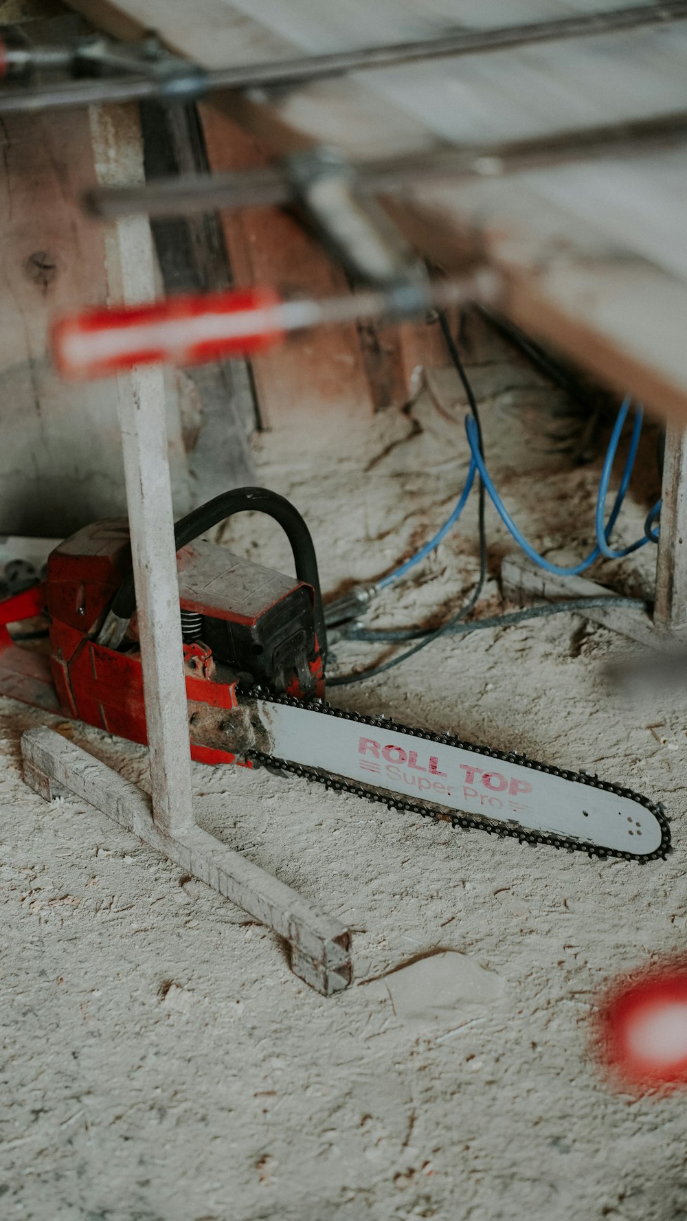 a chainsaw sitting in the middle of a room