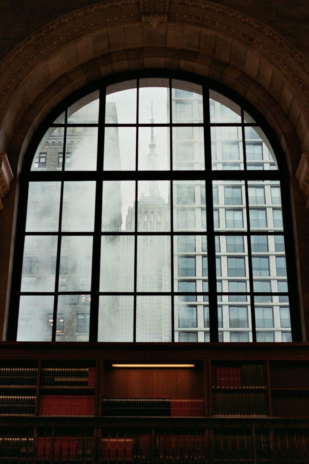 a large window with a view of a building