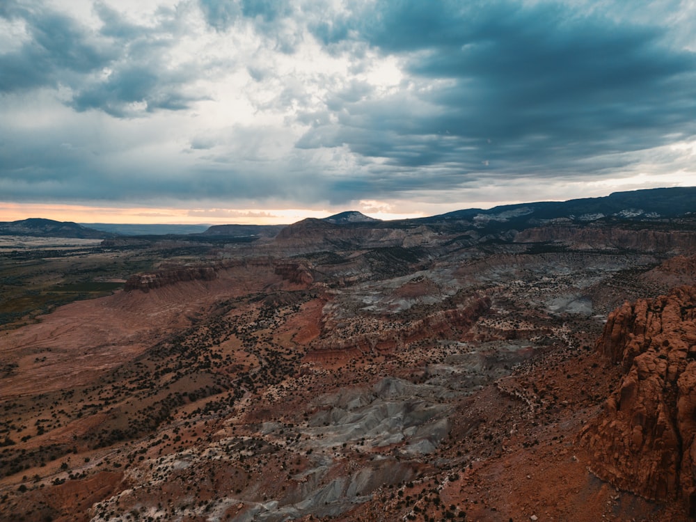 a view of a mountain range with a cloudy sky