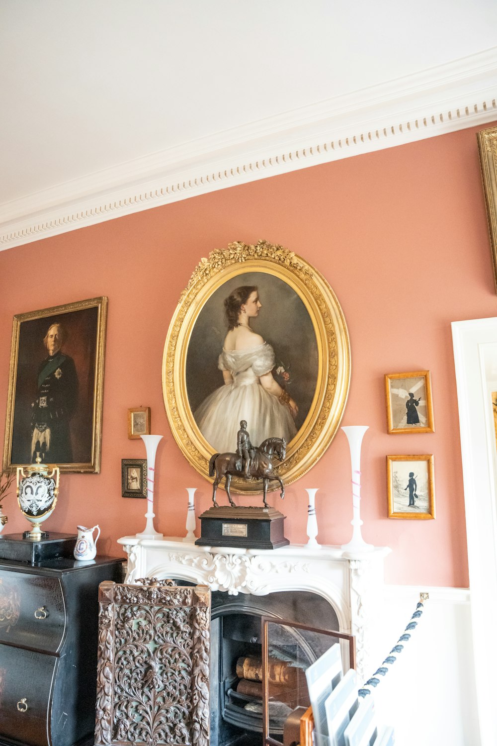 a painting of a woman in a white dress in a pink room