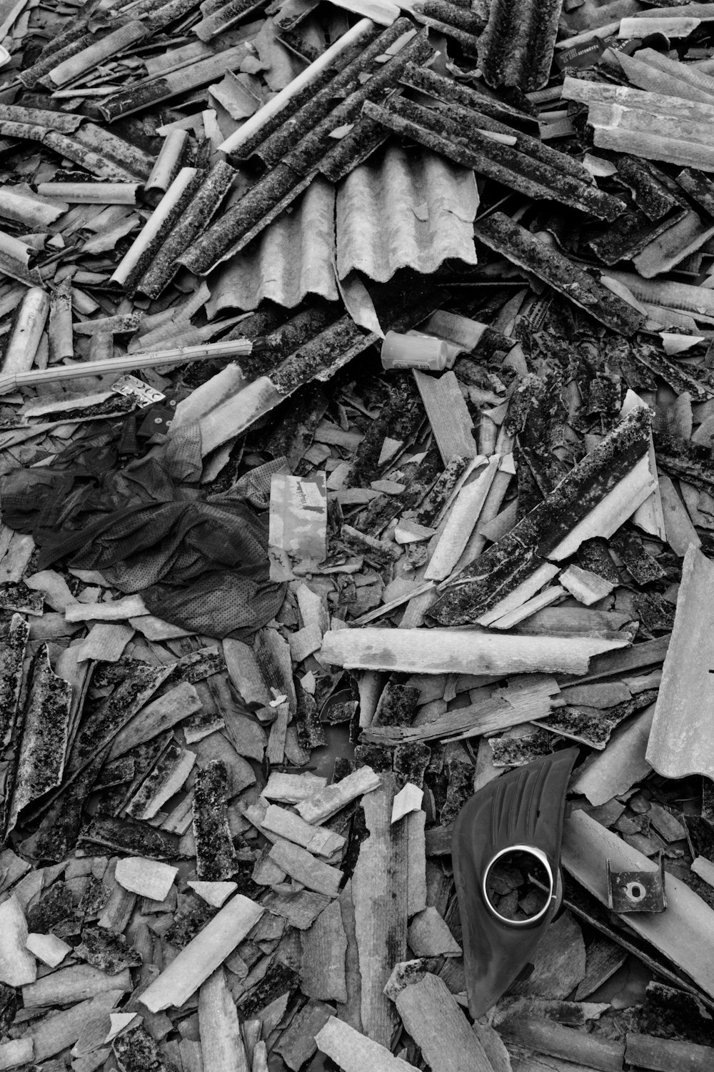 a pile of wood shavings and a pair of scissors