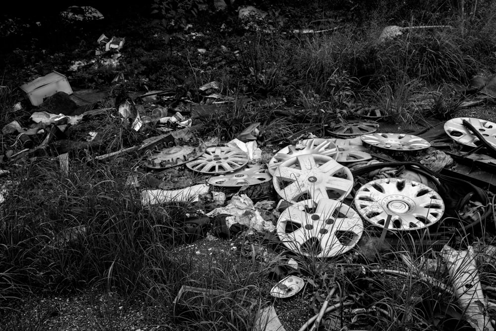 a black and white photo of a pile of junk