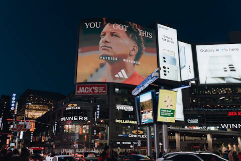 a city street filled with lots of tall buildings