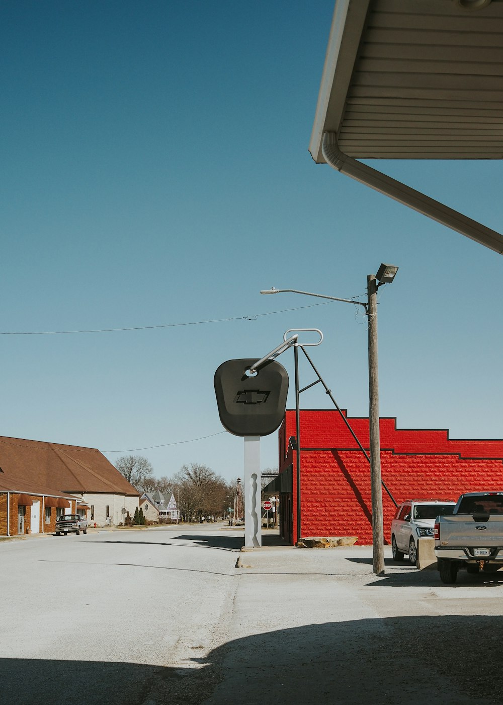 a gas station with a truck parked in front of it