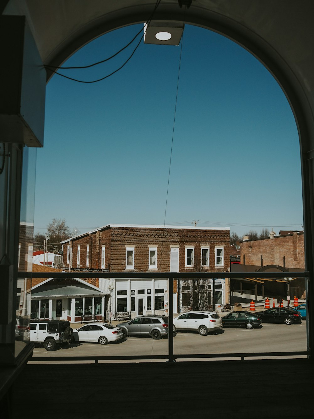 a view of a street through a window