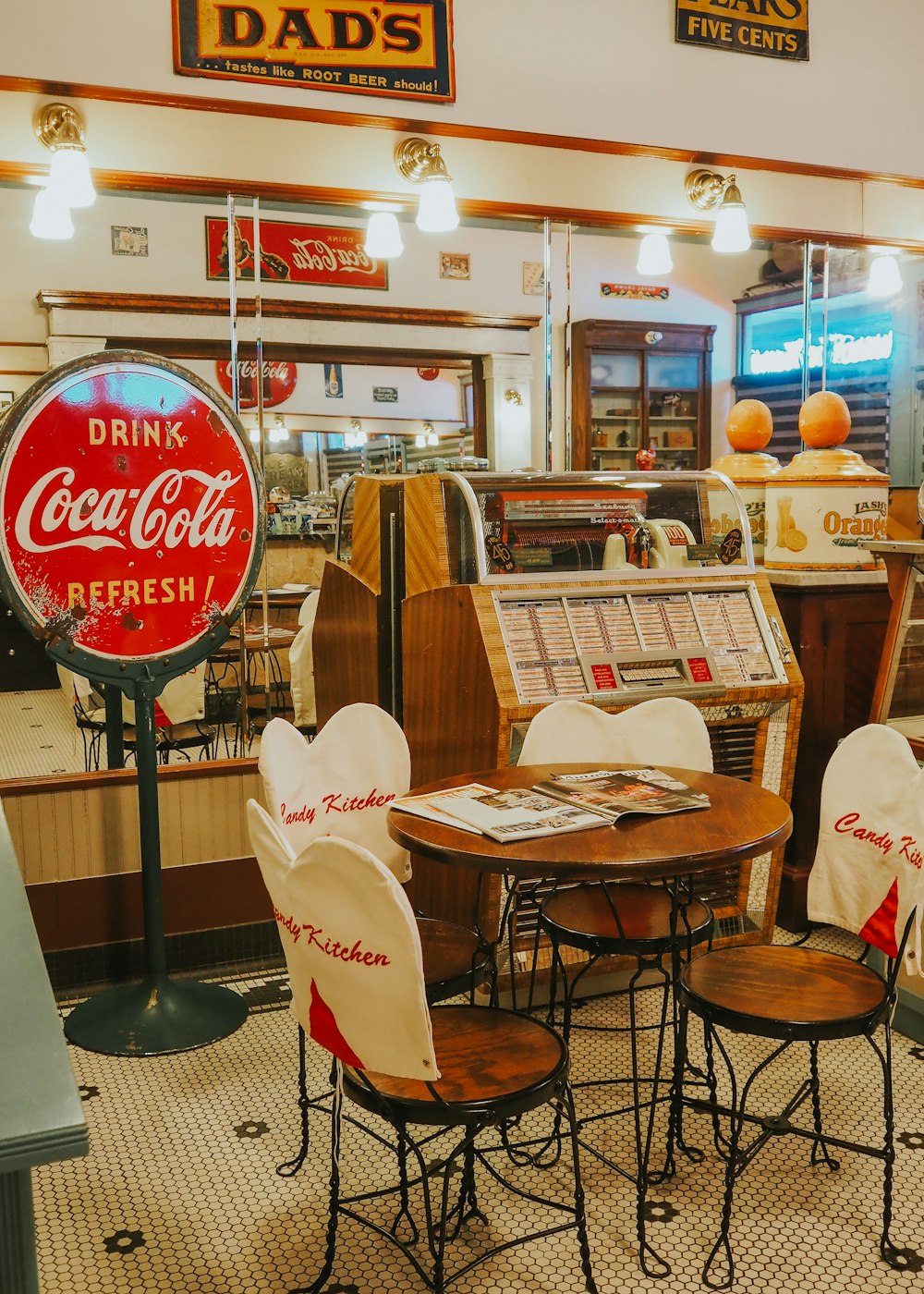 a restaurant with tables and chairs and a menu