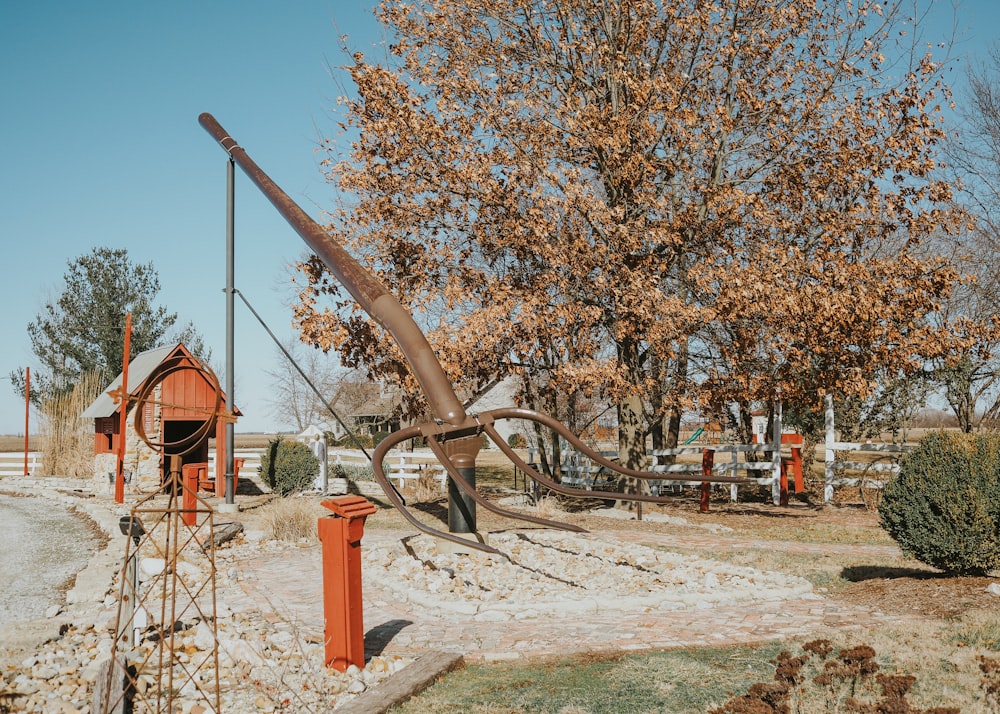 a large metal object in the middle of a field