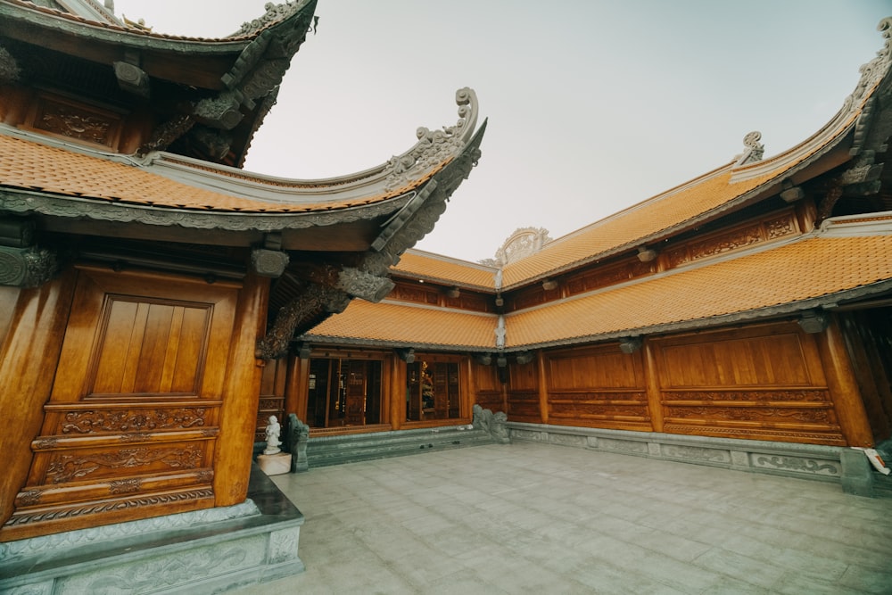 a large building with a lot of wooden doors