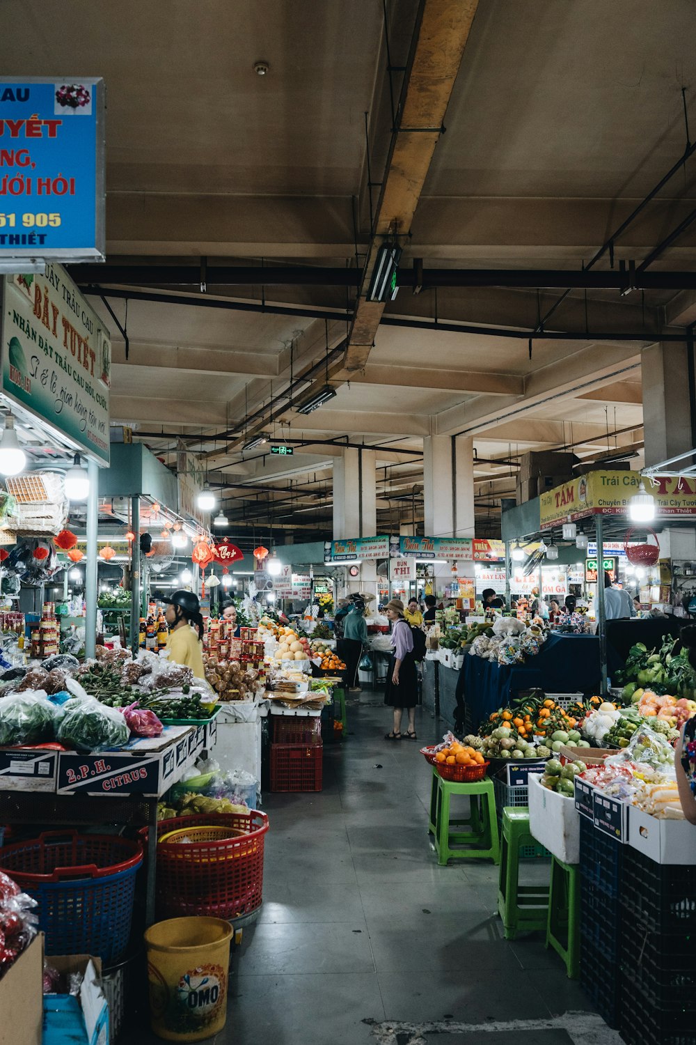 a market filled with lots of fruits and vegetables