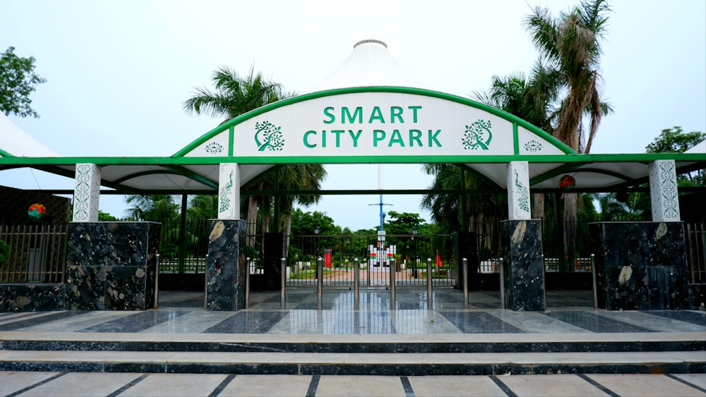 a green and white smart city park entrance