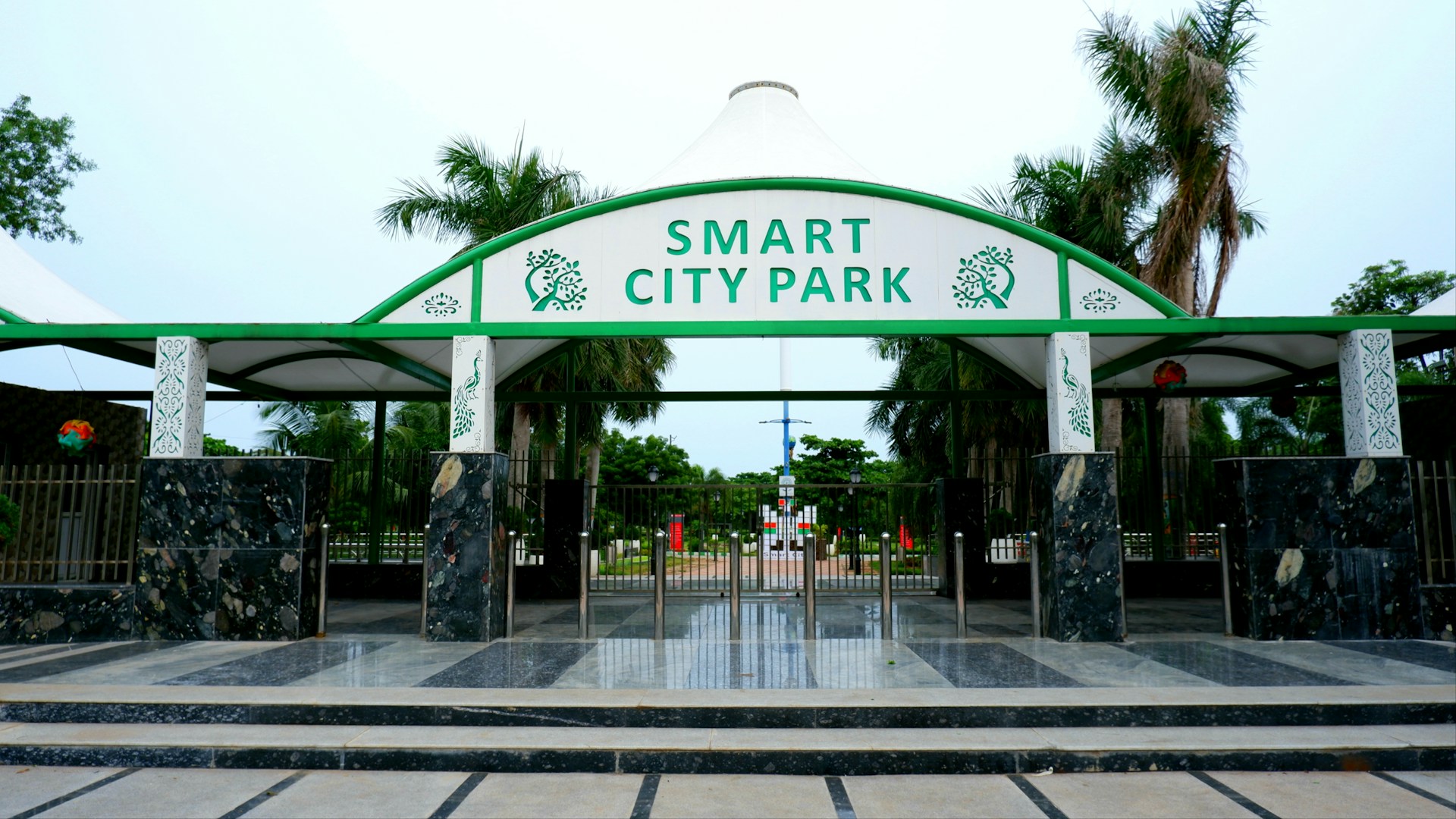a green and white smart city park entrance