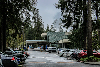 a parking lot filled with lots of parked cars