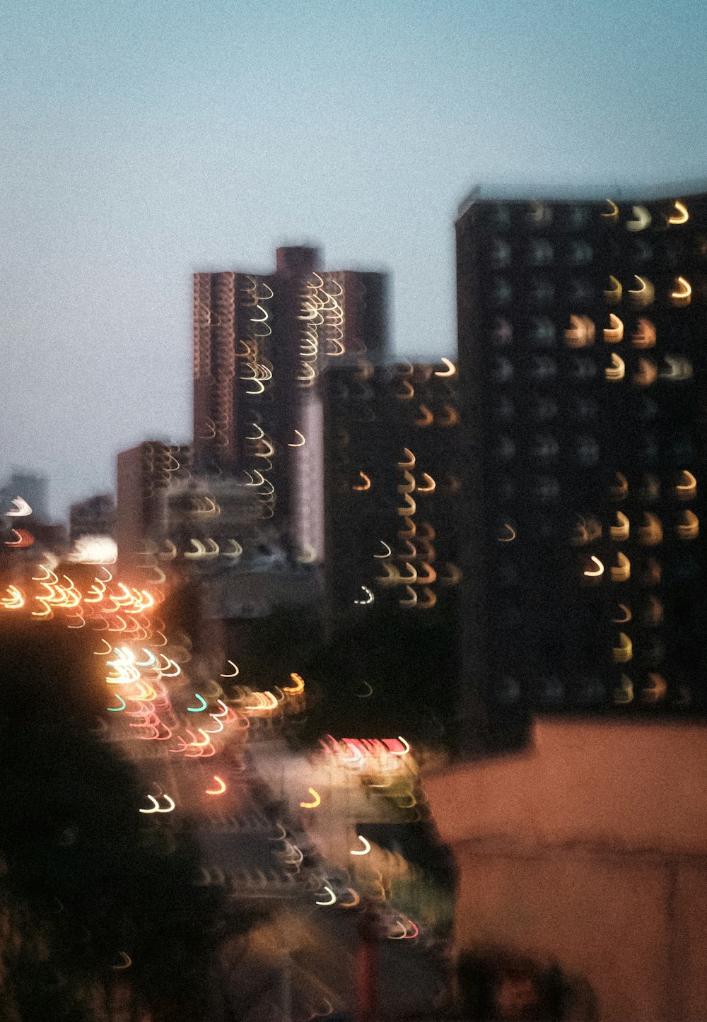 a blurry photo of a city at night