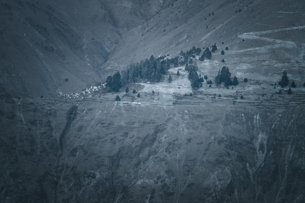 a black and white photo of a mountain range