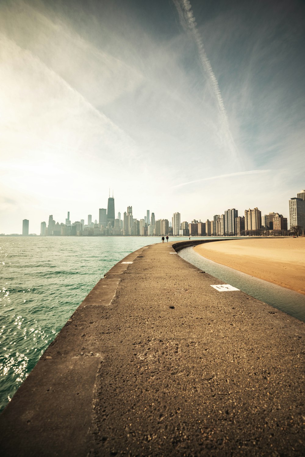 a view of a city skyline from a pier