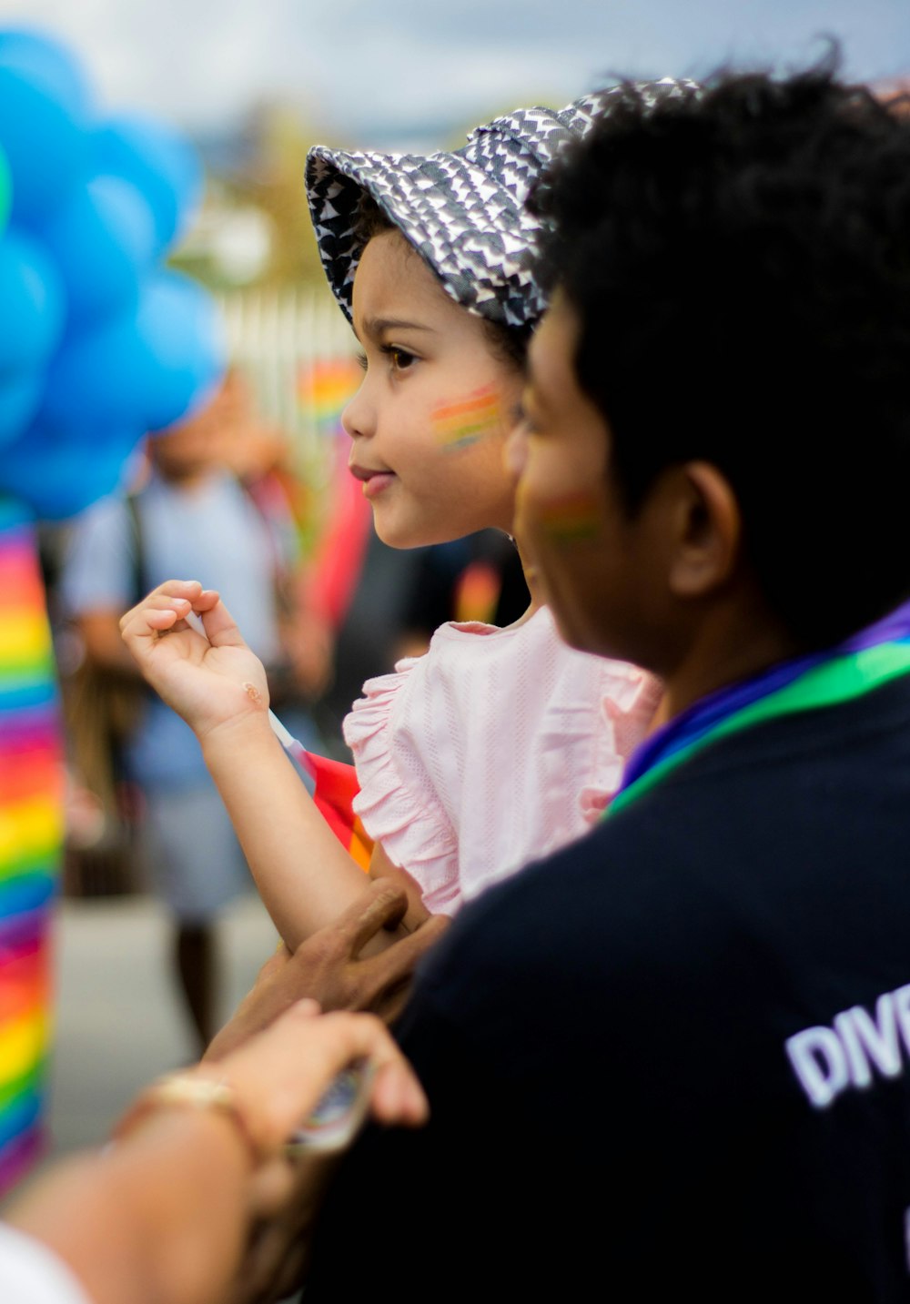 a boy and a girl standing next to each other