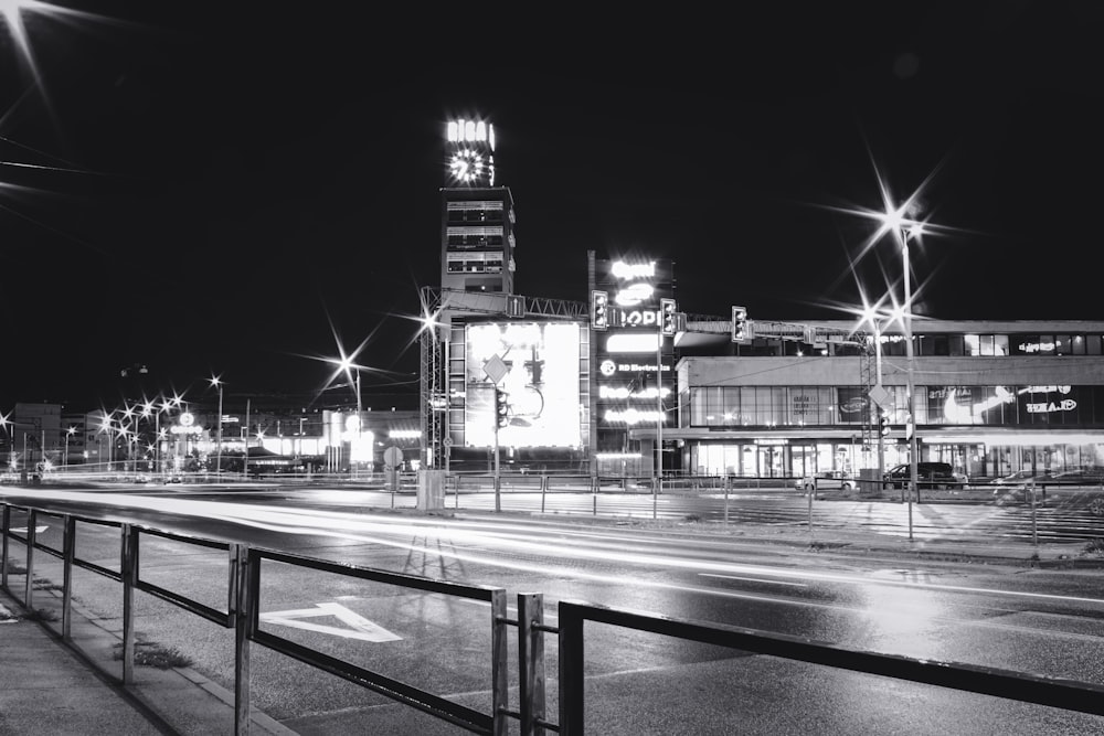 a black and white photo of a city at night