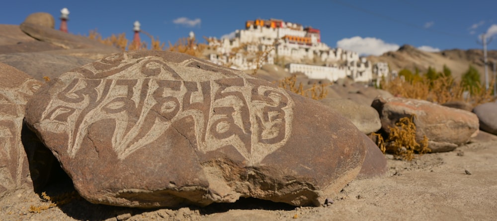 a rock with some writing on it