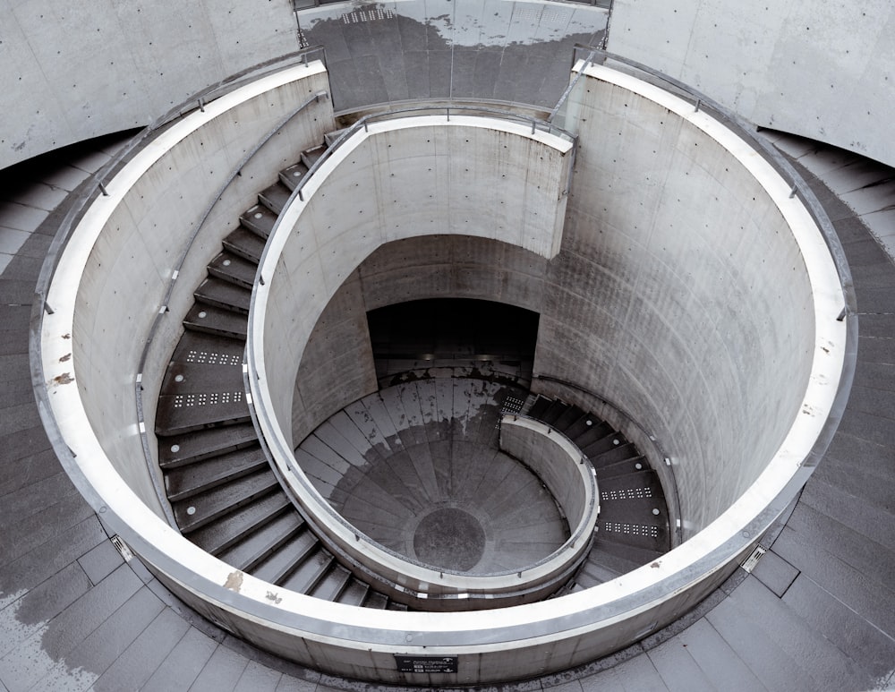 a spiral staircase in a concrete building