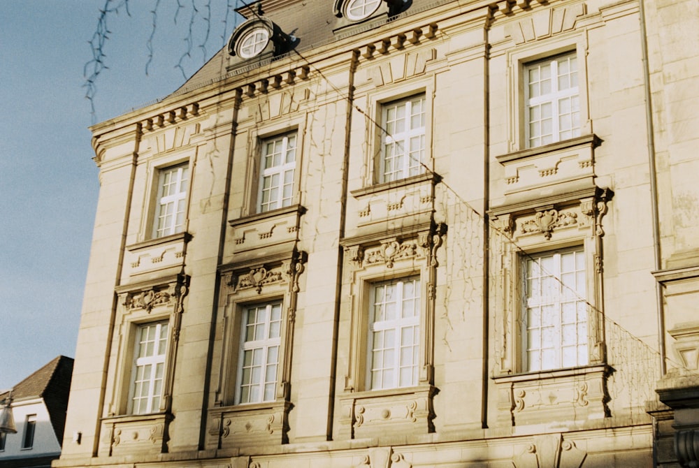 a large building with a clock on the top of it