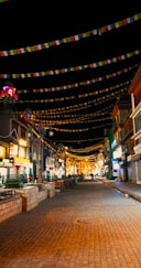 a city street with a lot of lights on it