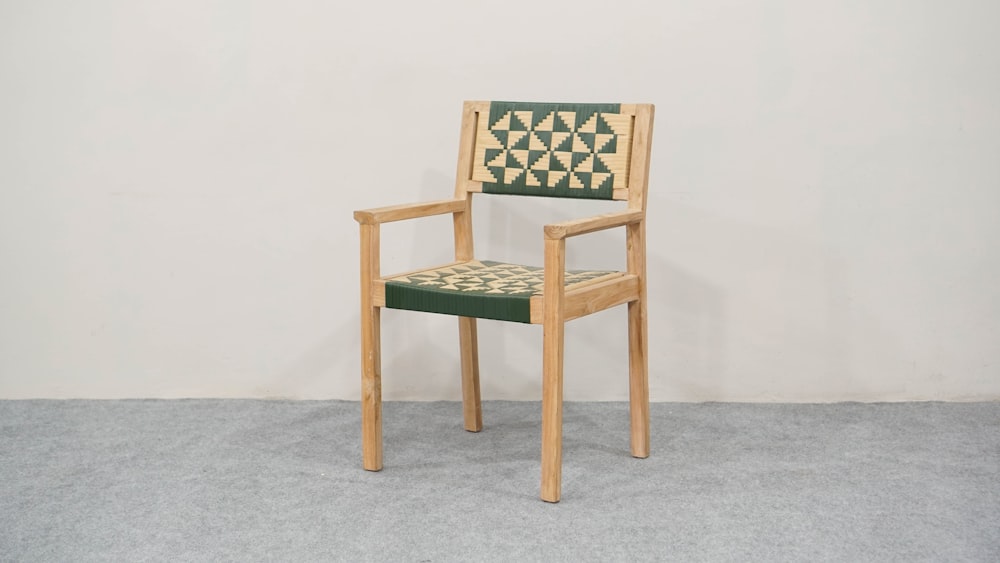 a wooden chair with a checkered seat and back
