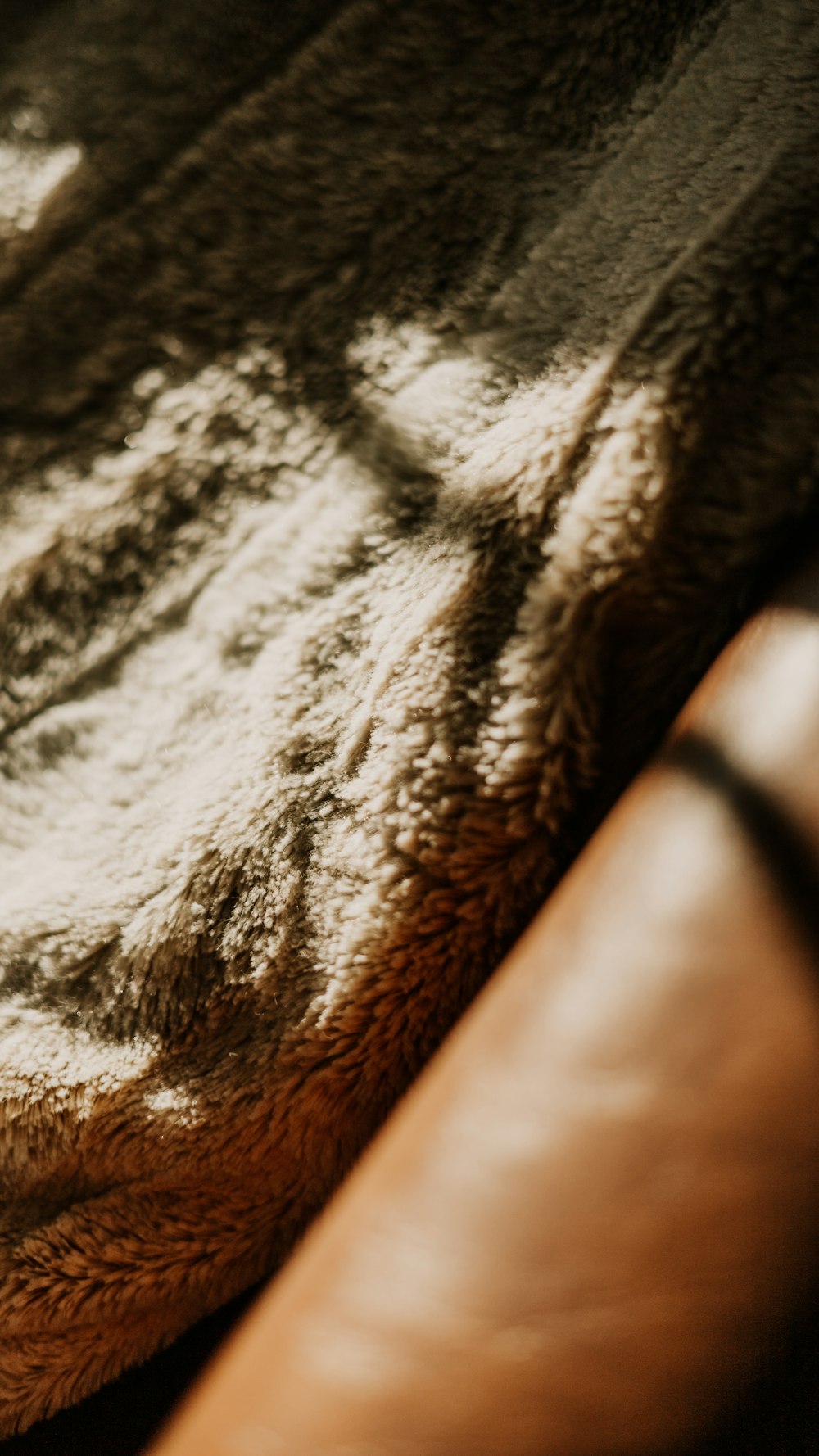 a close up of a blanket on a couch