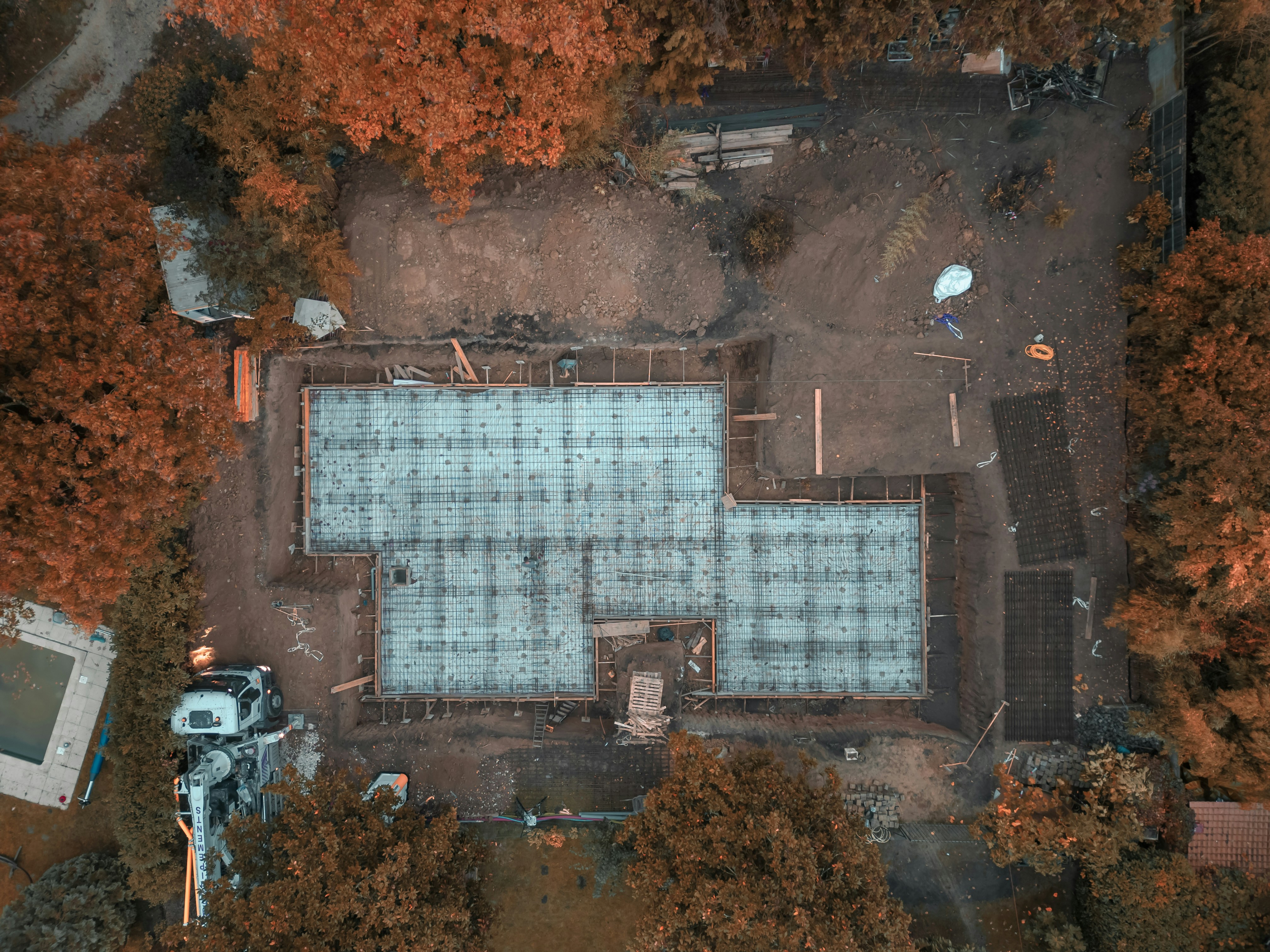 A constcruction site under construction by construction workers.